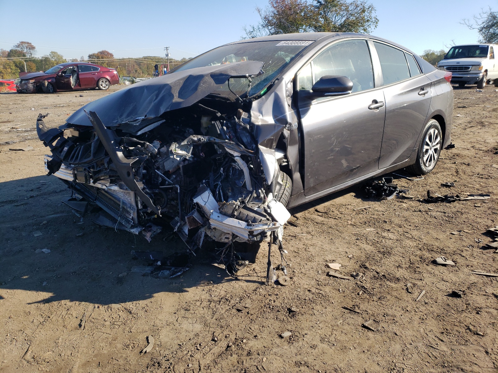 Photo 2 from auction – 2021 TOYOTA PRIUS PRIM with VIN JTDKAMFP2M3189658