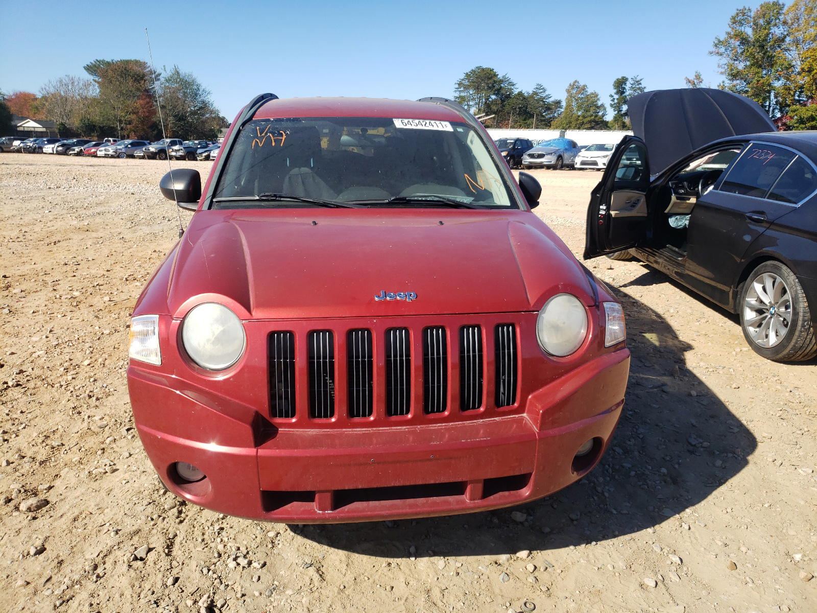 Photo 9 from auction – 2010 JEEP COMPASS SP with VIN 1J4NT4FB3AD612002