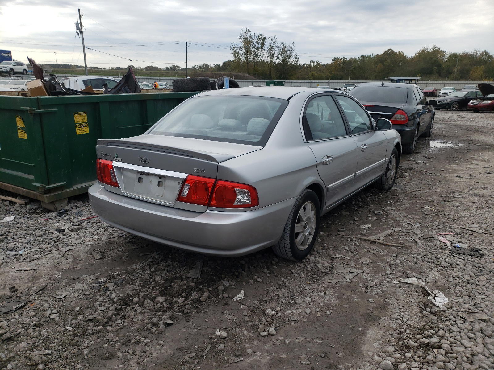 Photo 4 from auction – 2003 KIA OPTIMA LX with VIN KNAGD128935234864