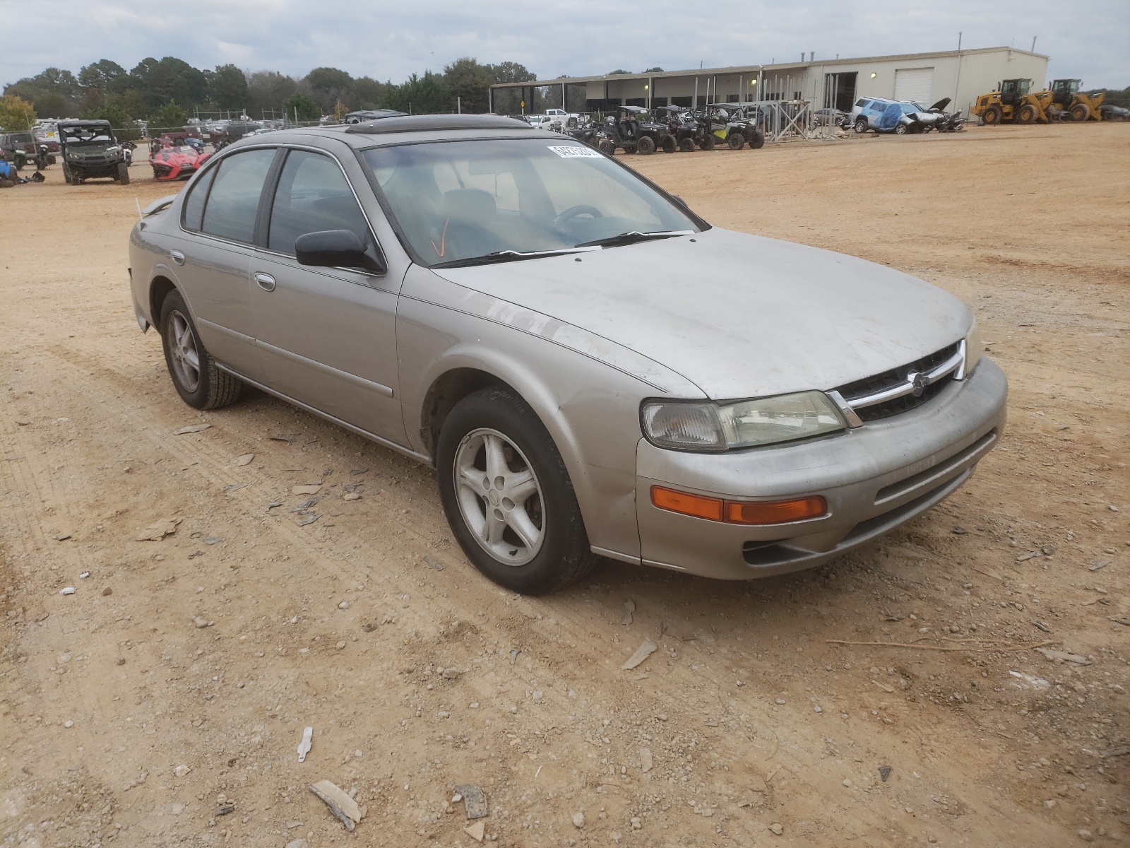 NISSAN MAXIMA GLE 1999 with VIN JN1CA21A3XT106029 - Photo from auction