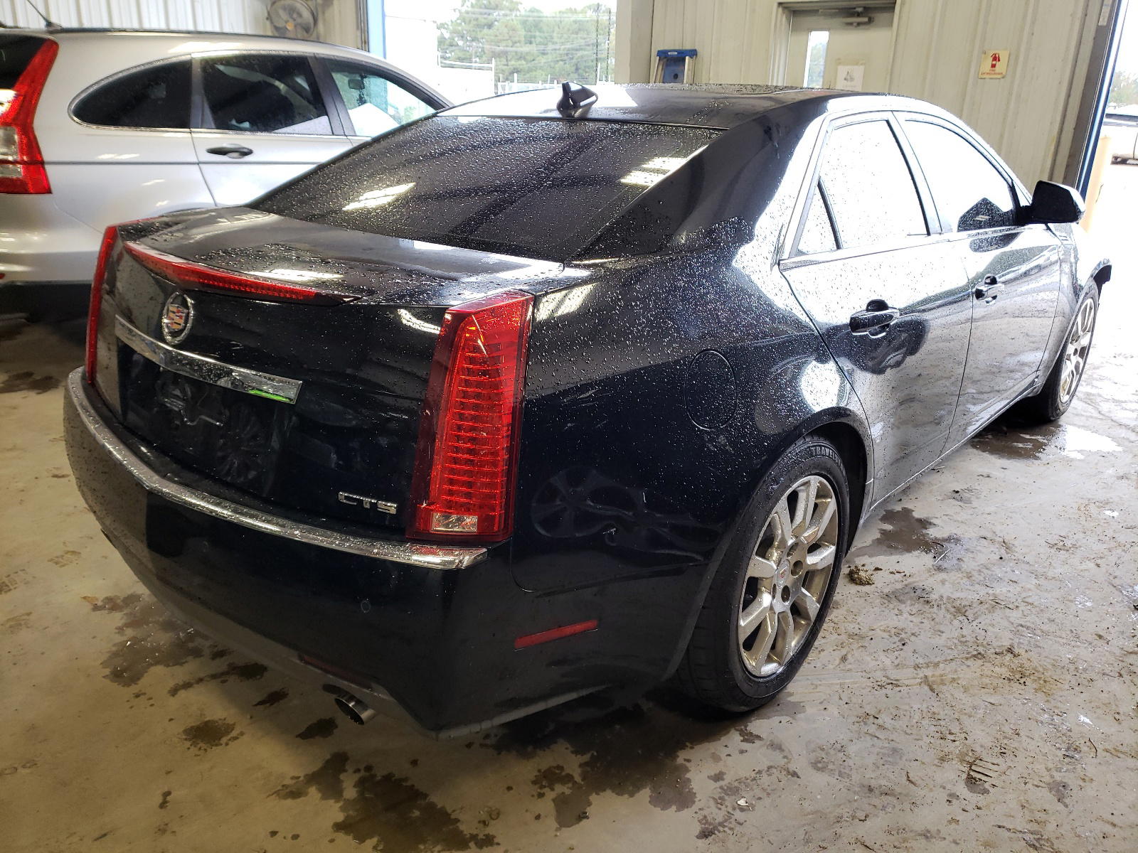 Photo 4 from auction – 2009 CADILLAC CTS with VIN 1G6DJ577390139876
