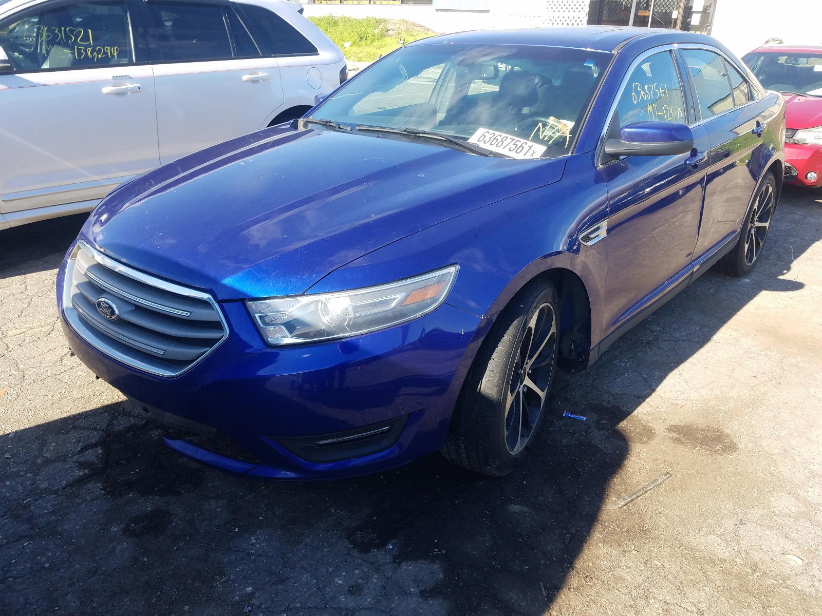 Photo 2 from auction – 2015 FORD TAURUS SEL with VIN 1FAHP2E88FG127397
