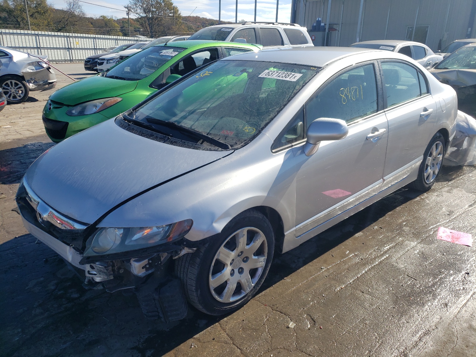 Photo 2 from auction – 2011 HONDA CIVIC LX with VIN 19XFA1F50BE044090