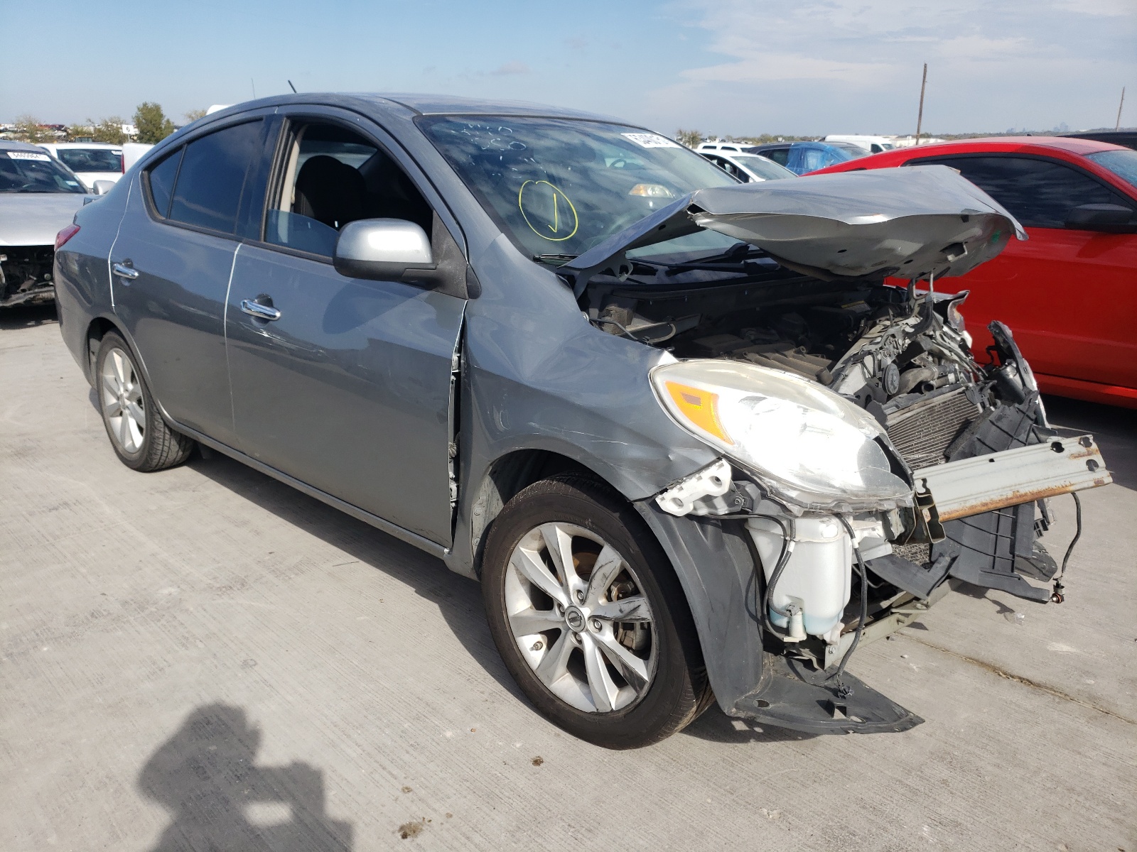 NISSAN VERSA S 2014 with VIN 3N1CN7APXEL852081 - Photo from auction
