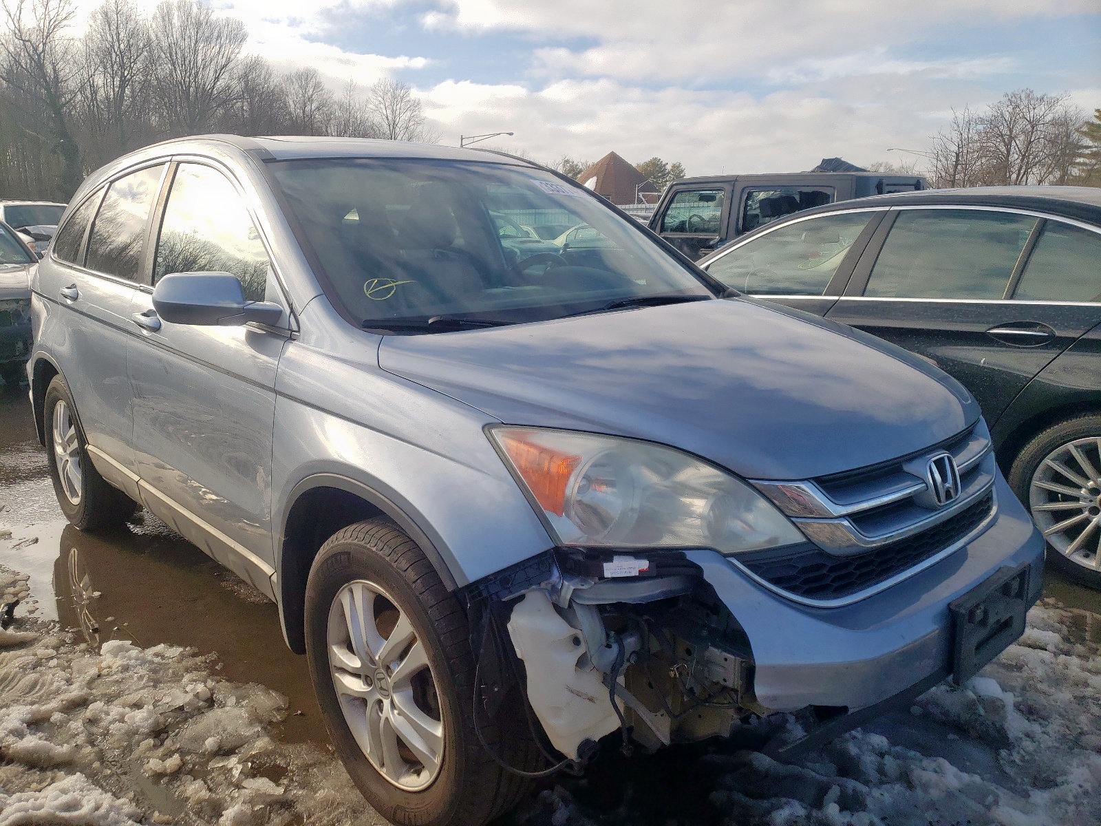 Photo 1 from auction – 2011 HONDA CR-V EXL with VIN 5J6RE4H79BL046536