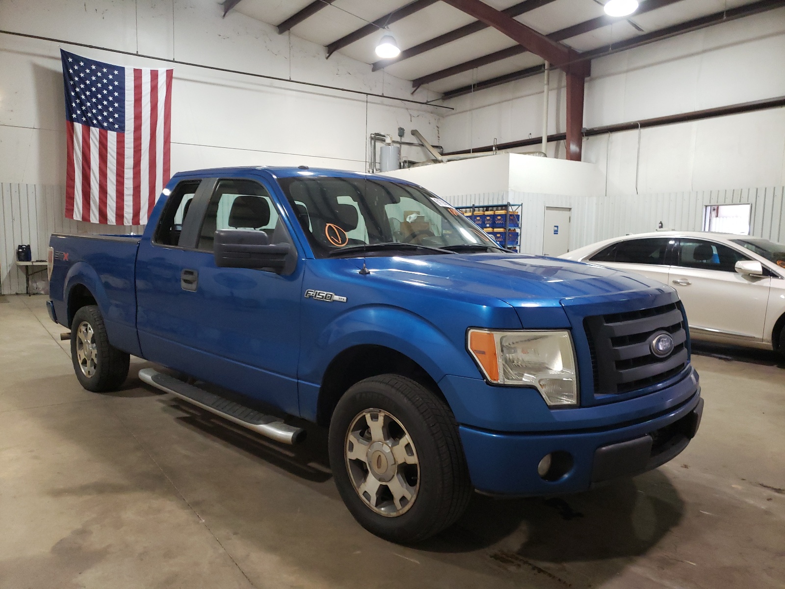 FORD F150 SUPER 2010 with VIN 1FTEX1CW4AFA29541 - Photo from auction