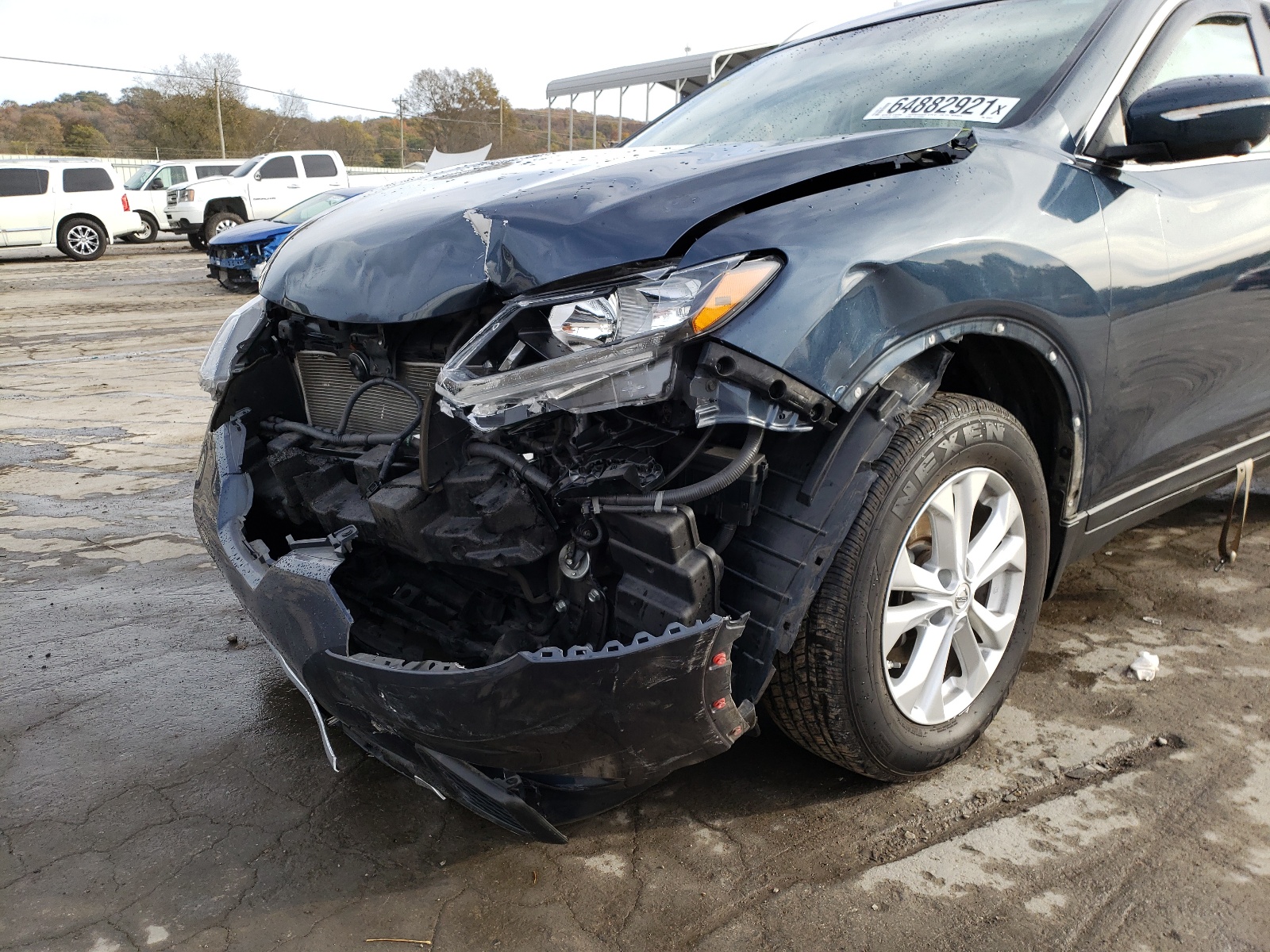 Photo 9 from auction – 2015 NISSAN ROGUE S with VIN 5N1AT2MT5FC923623