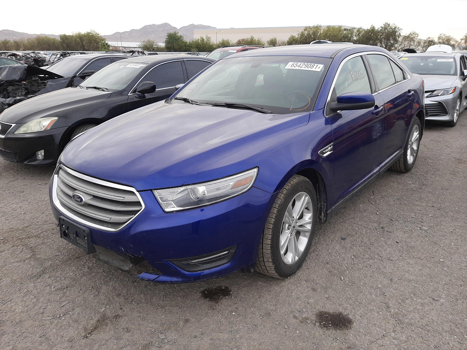 Photo 2 from auction – 2013 FORD TAURUS SEL with VIN 1FAHP2E83DG229770