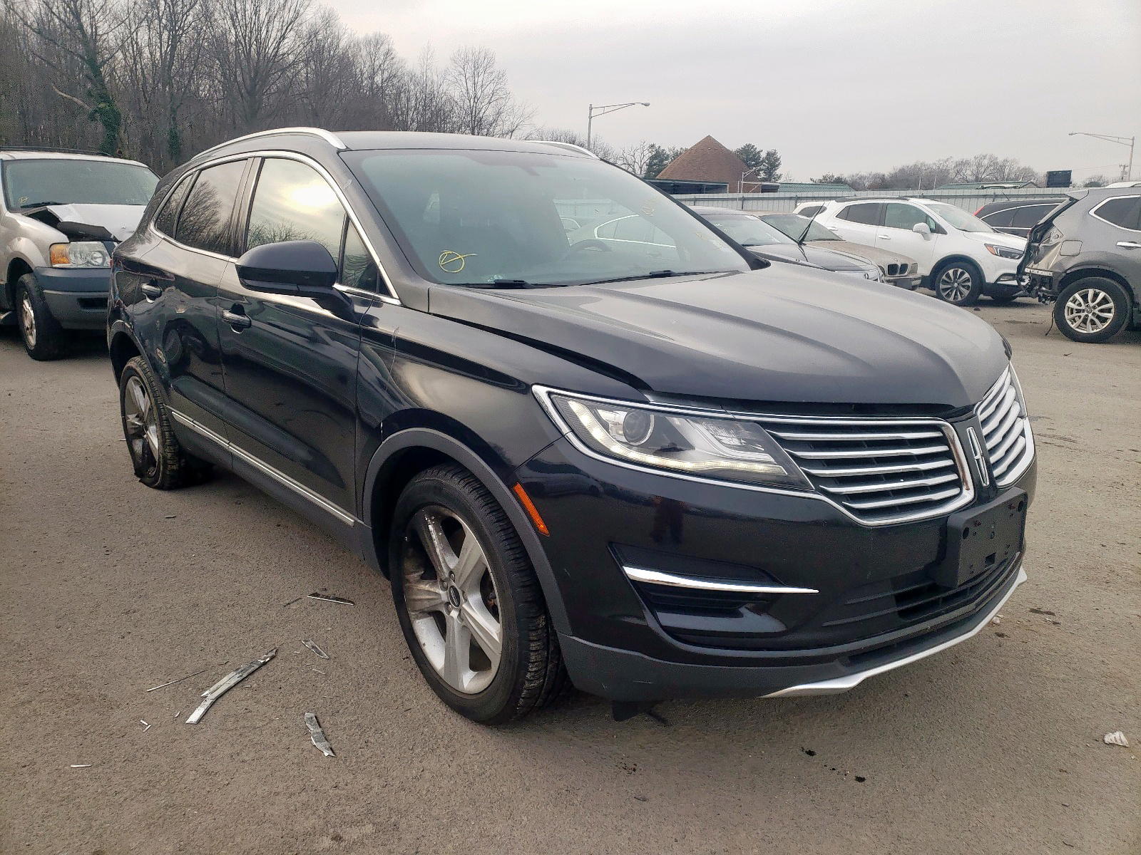 LINCOLN MKC 2015 with VIN 5LMCJ1A92FUJ45712 - Photo from auction