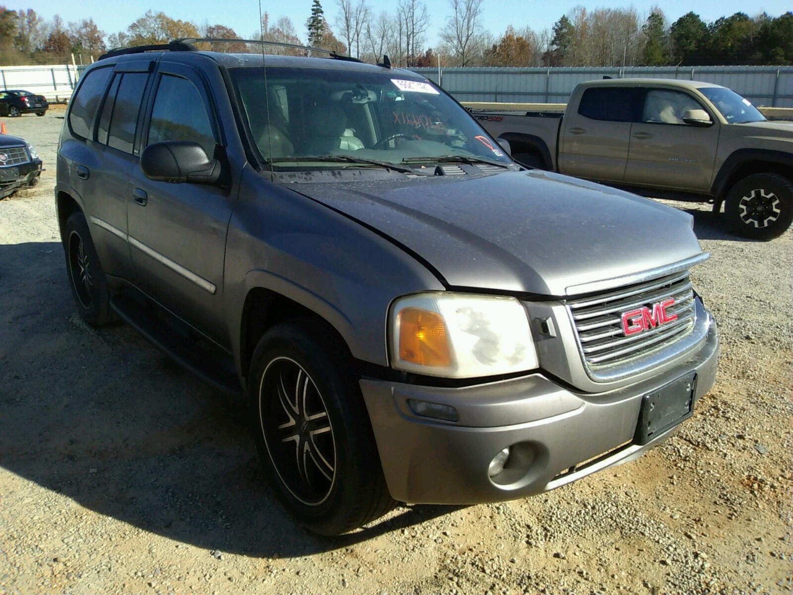 GMC ENVOY 2008 with VIN 1GKDT13S582160617 - Photo from auction
