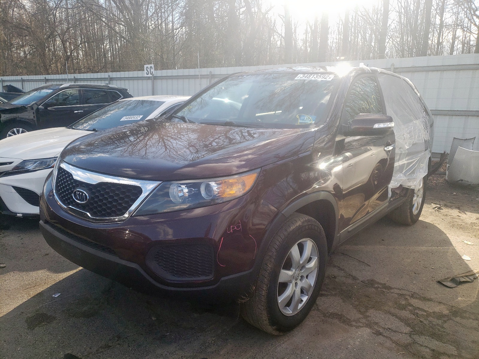 Photo 2 from auction – 2013 KIA SORENTO LX with VIN 5XYKT3A18DG325620