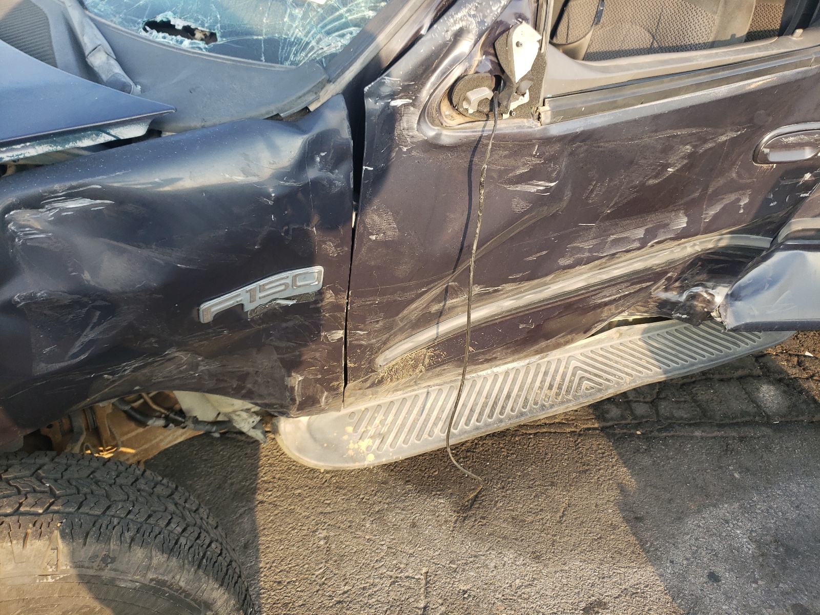 Photo 10 from auction – 1999 FORD F150 with VIN 1FTRX17W5XKB41745