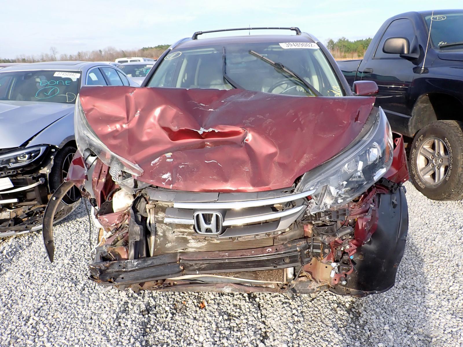 Photo 7 from auction – 2012 HONDA CR-V EXL with VIN 5J6RM3H76CL021883