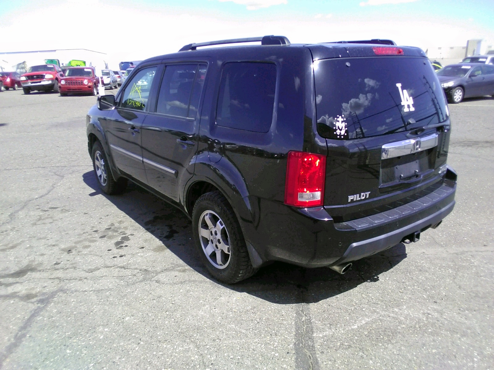 Photo 3 from auction – 2010 HONDA PILOT TOUR with VIN 5FNYF4H88AB039909
