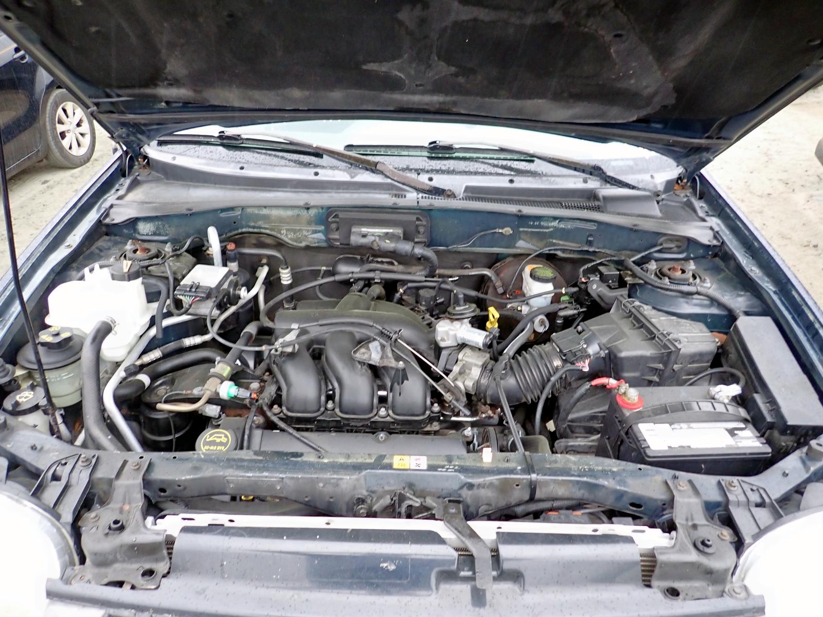 Photo 7 from auction – 2002 FORD ESCAPE XLS with VIN 1FMYU01192KB02818