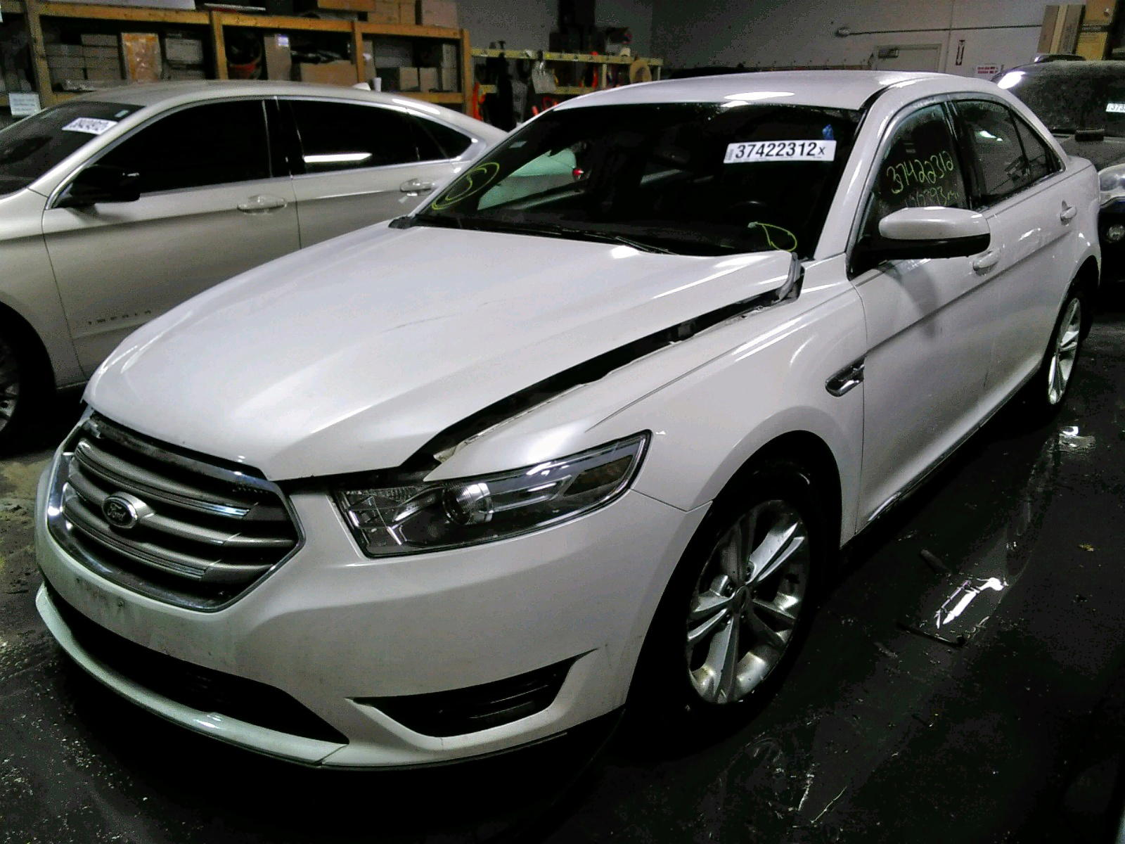 Photo 2 from auction – 2013 FORD TAURUS SEL with VIN 1FAHP2E80DG155501