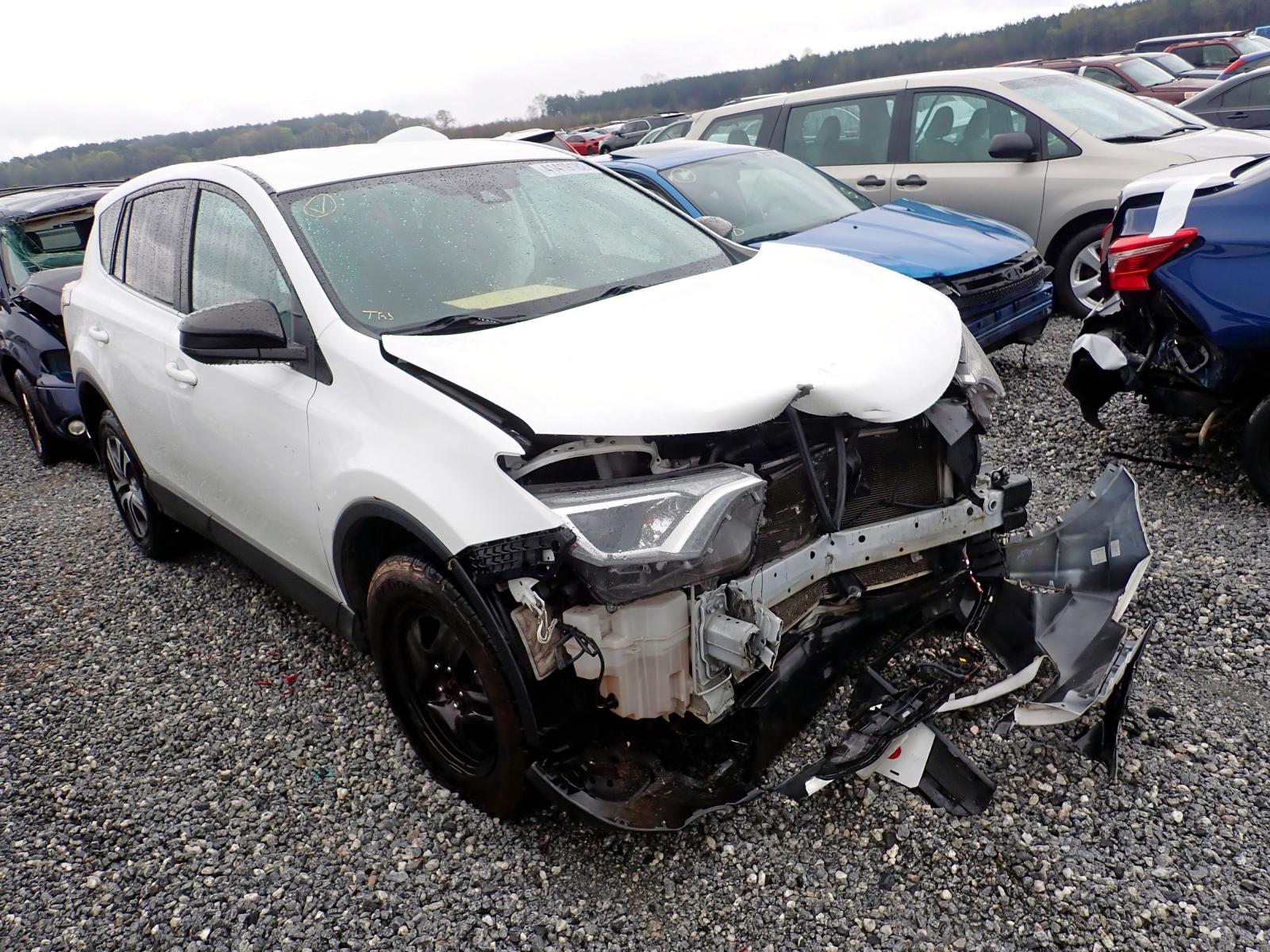 Photo 1 from auction – 2018 TOYOTA RAV4 LE with VIN 2T3BFREV1JW701319