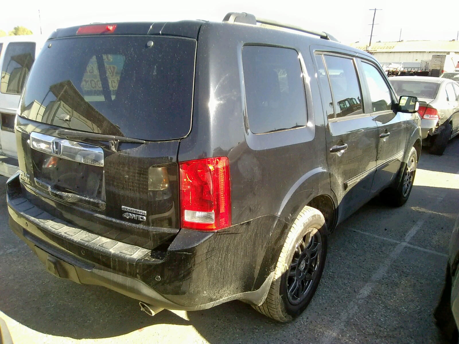Photo 4 from auction – 2012 HONDA PILOT TOUR with VIN 5FNYF4H95CB077402