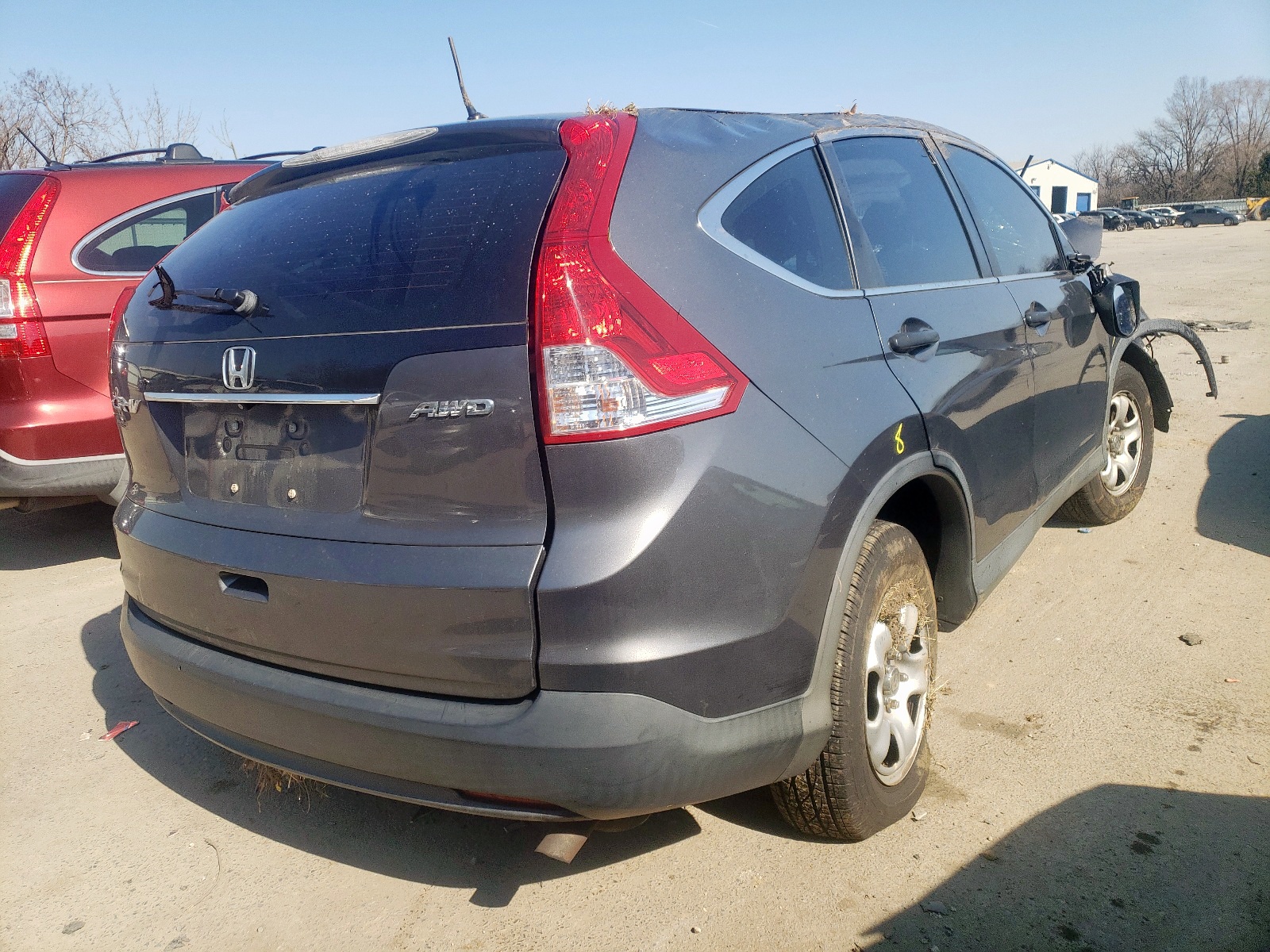 Photo 4 from auction – 2014 HONDA CR-V LX with VIN 2HKRM4H33EH688555