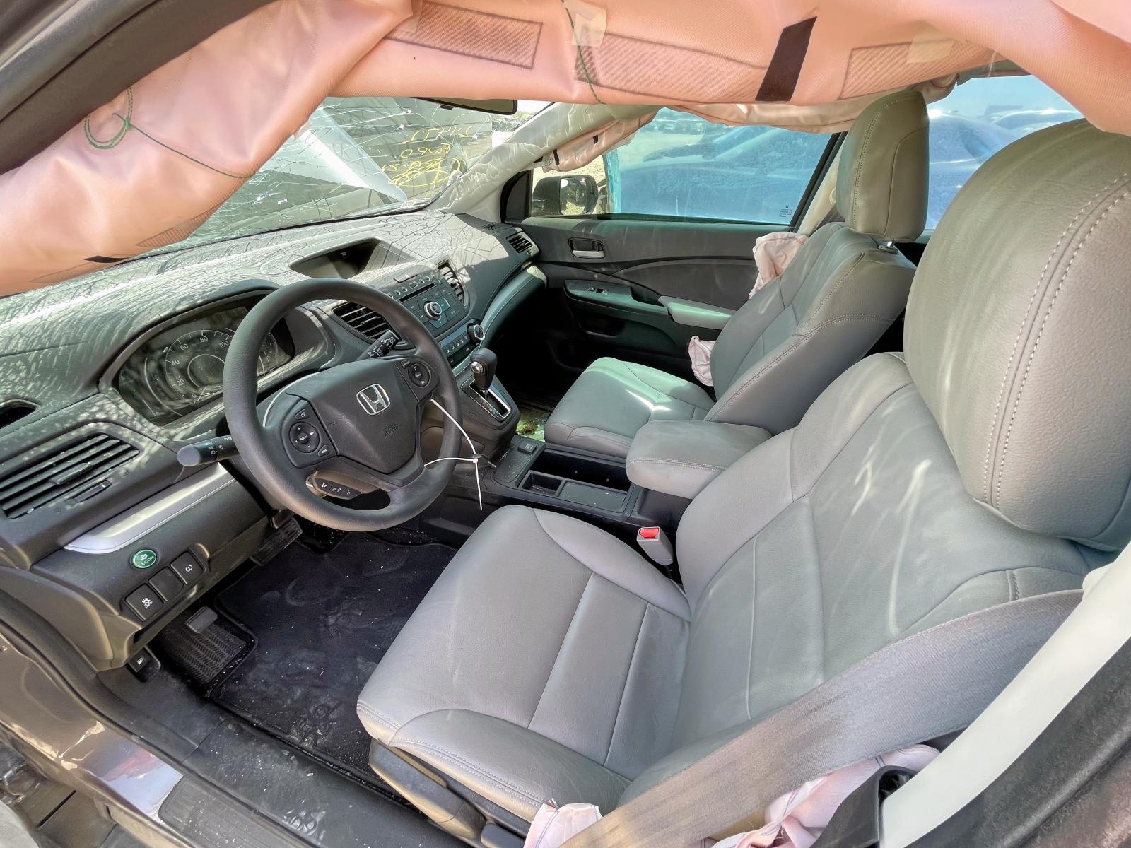 Photo 5 from auction – 2016 HONDA CR-V SE with VIN 2HKRM3H47GH514218