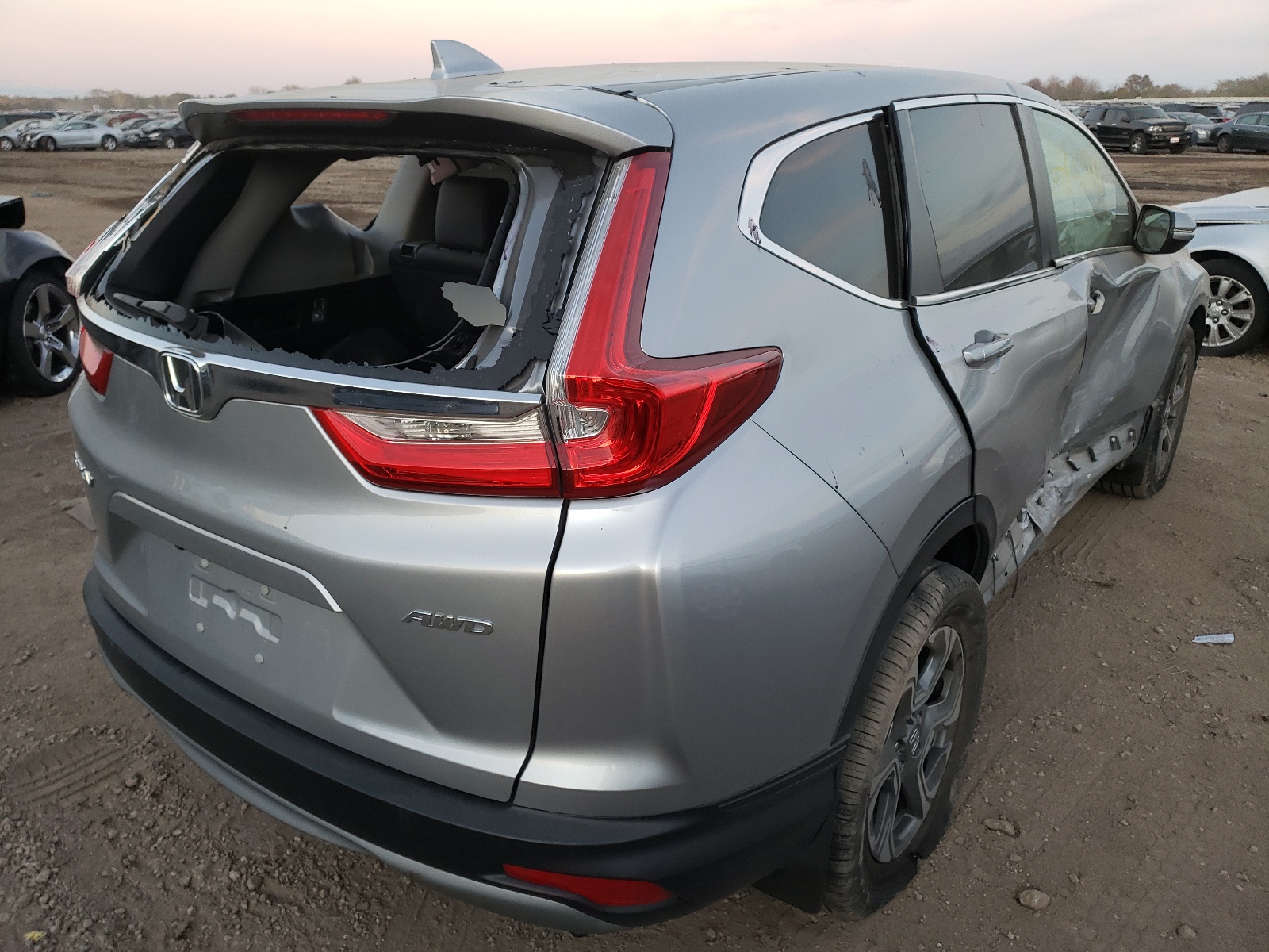 Photo 4 from auction – 2018 HONDA CR-V EXL with VIN 5J6RW2H89JL033178