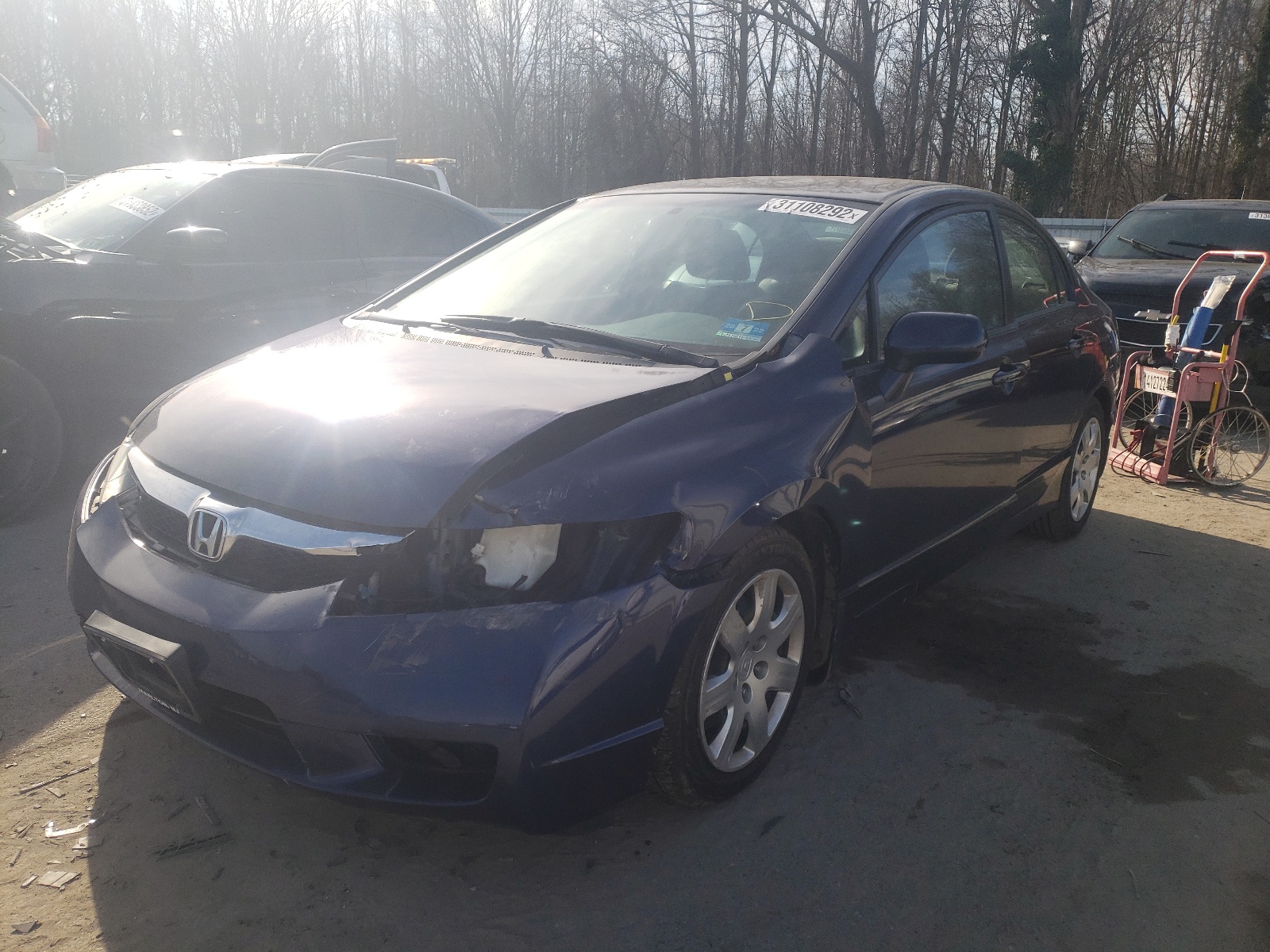 Photo 2 from auction – 2011 HONDA CIVIC LX with VIN 2HGFA1F55BH546728