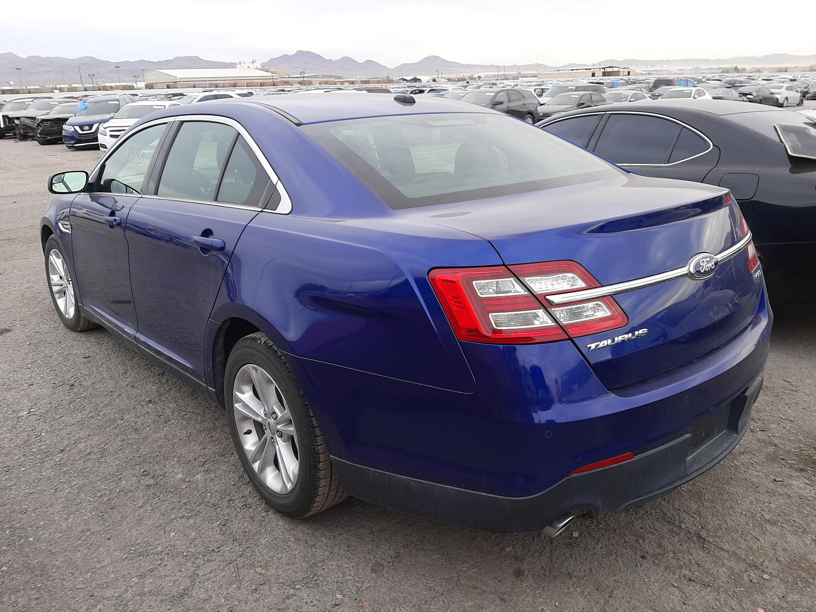 Photo 3 from auction – 2013 FORD TAURUS SEL with VIN 1FAHP2E83DG229770
