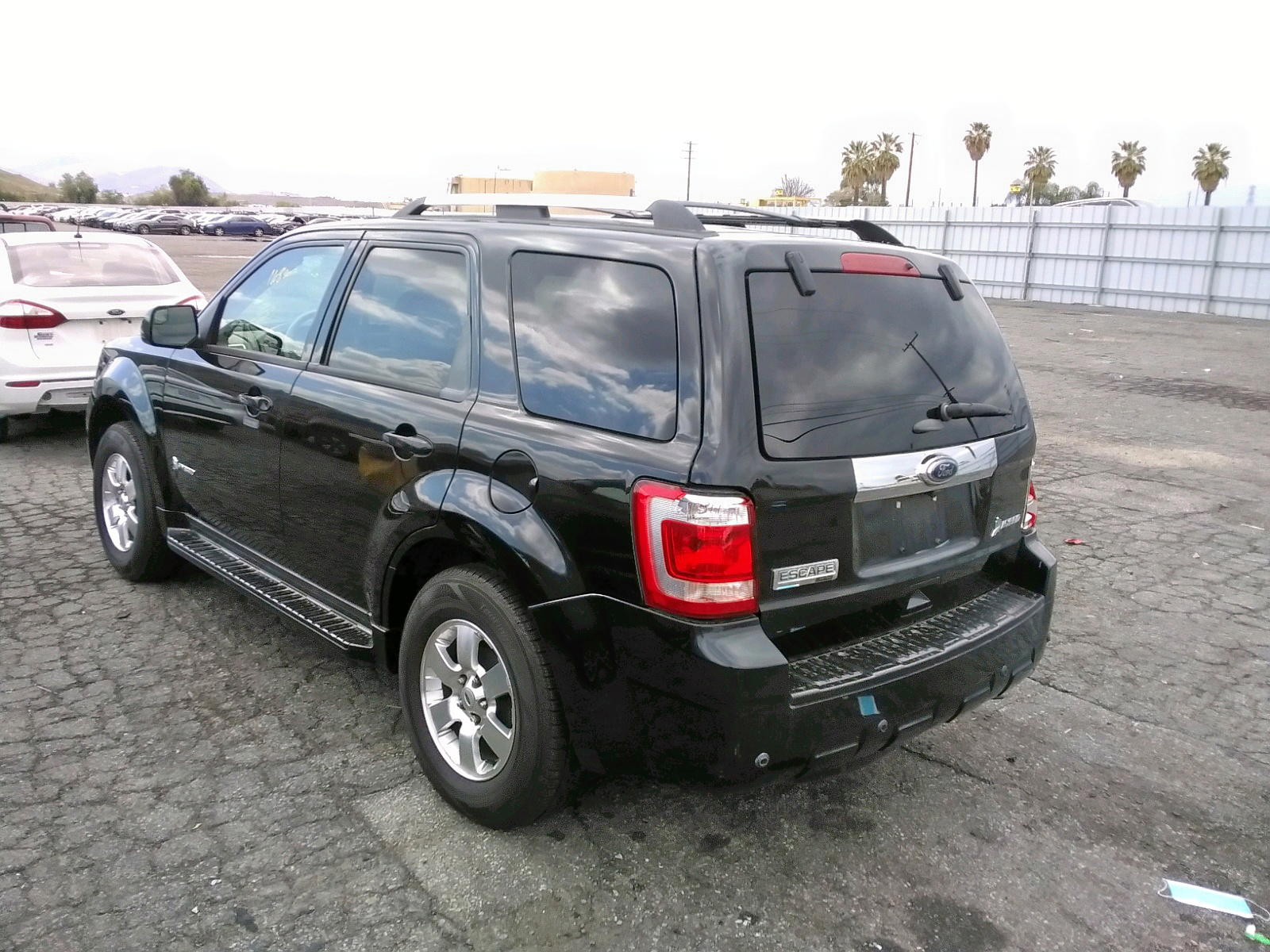 Photo 3 from auction – 2011 FORD ESCAPE HYB with VIN 1FMCU4K38BKB59710