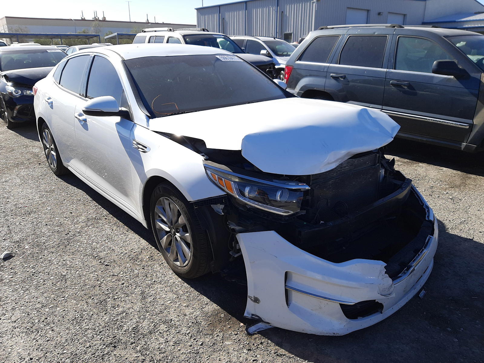 KIA OPTIMA EX 2016 with VIN 5XXGU4L39GG065504 - Photo from auction
