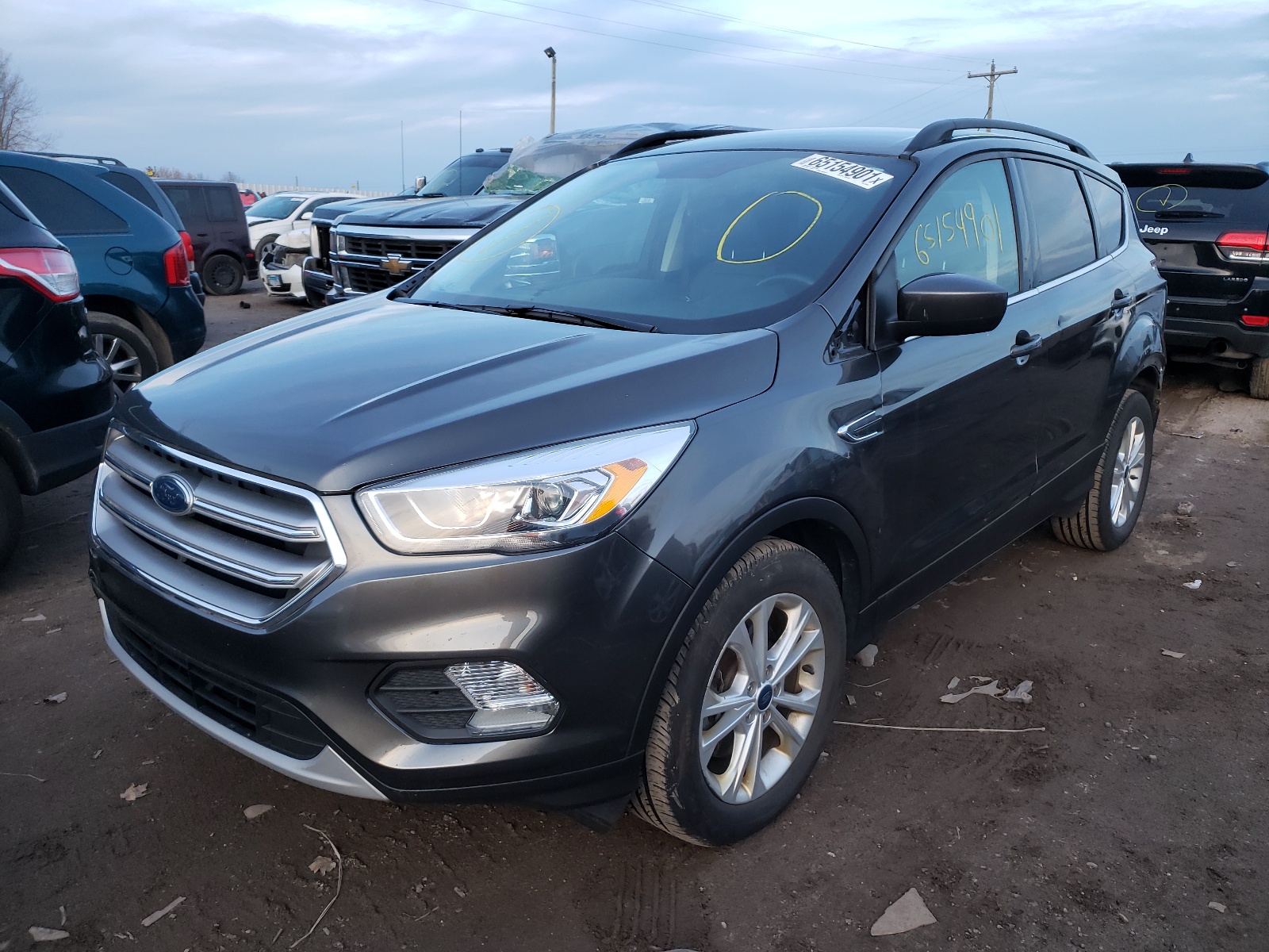 Photo 2 from auction – 2017 FORD ESCAPE SE with VIN 1FMCU0G95HUE33979
