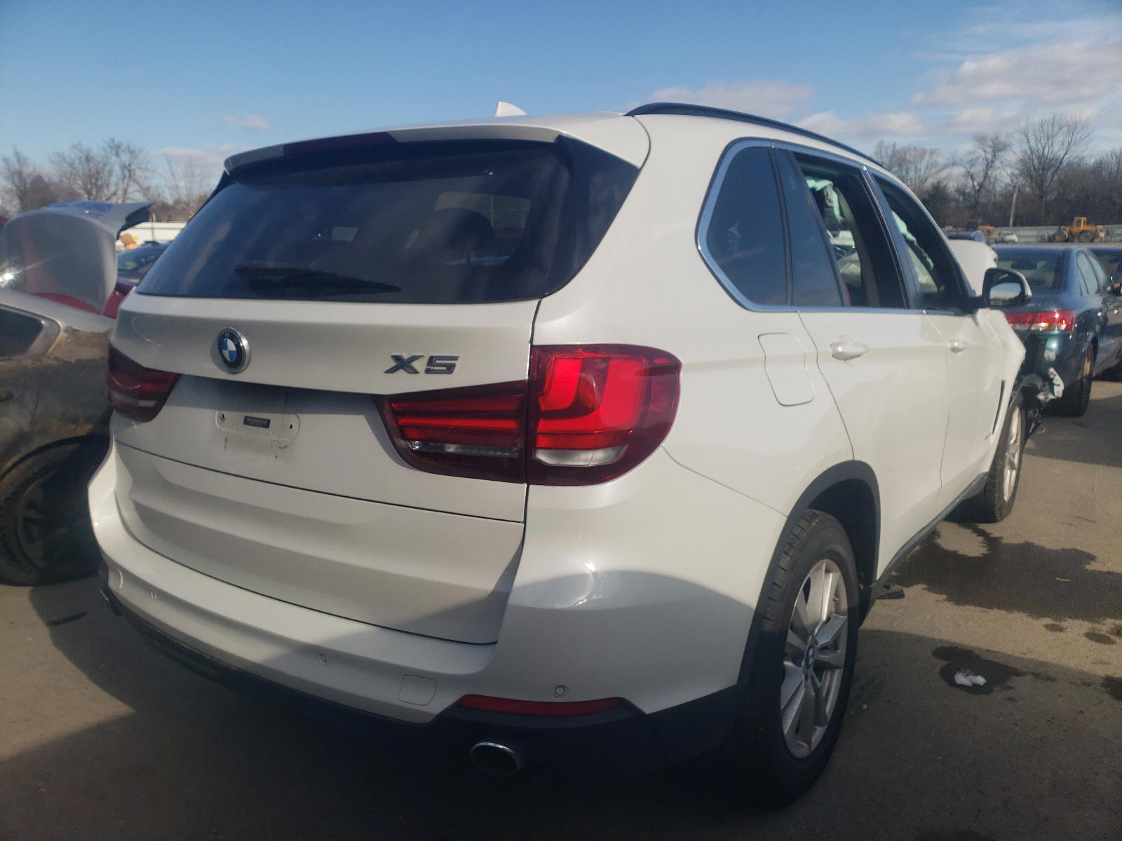 Photo 4 from auction – 2014 BMW X5 XDRIVE3 with VIN 5UXKR0C5XE0H17455