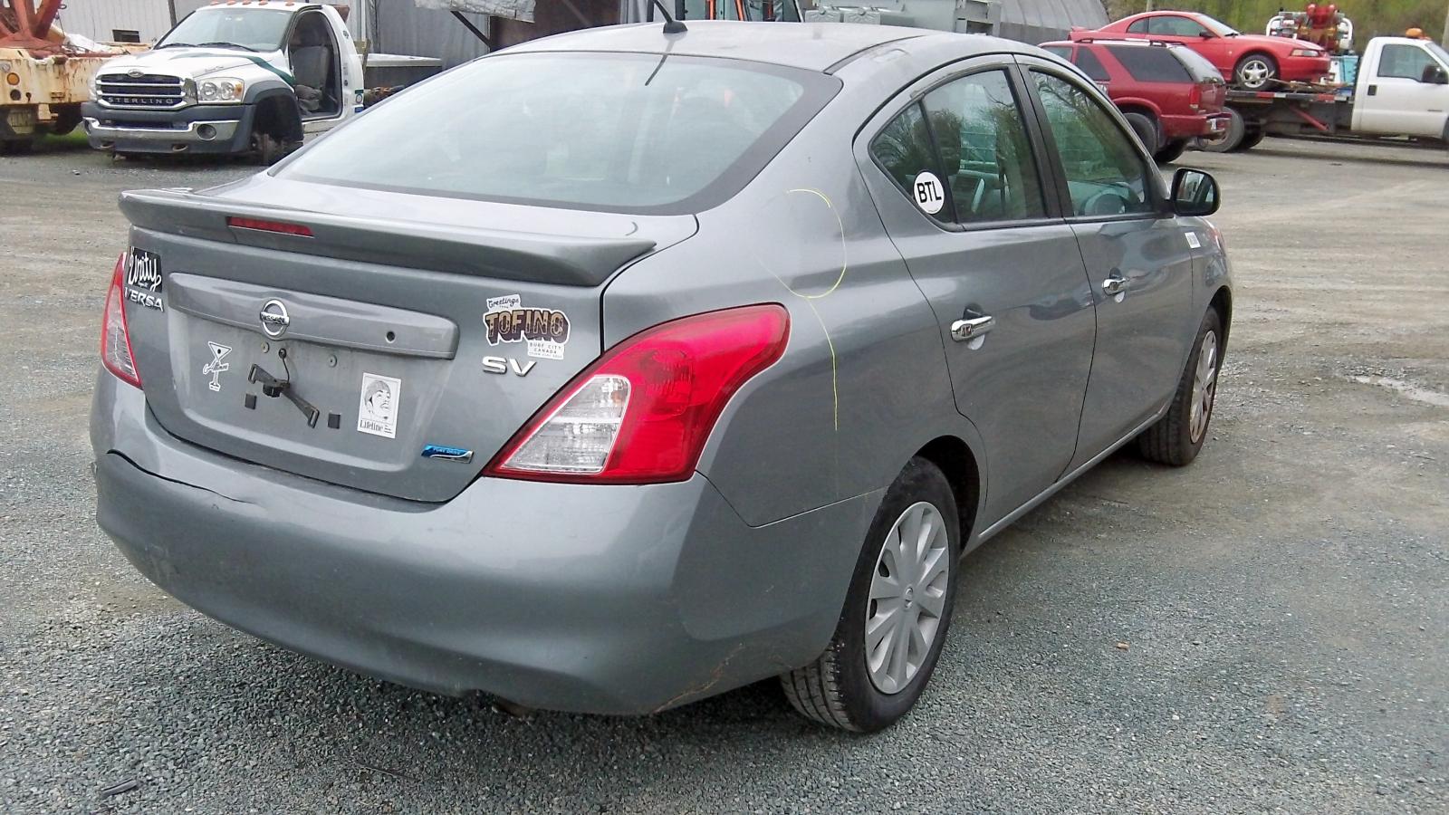 Photo 15 from auction – 2013 NISSAN VERSA S with VIN 3N1CN7AP3DL876284