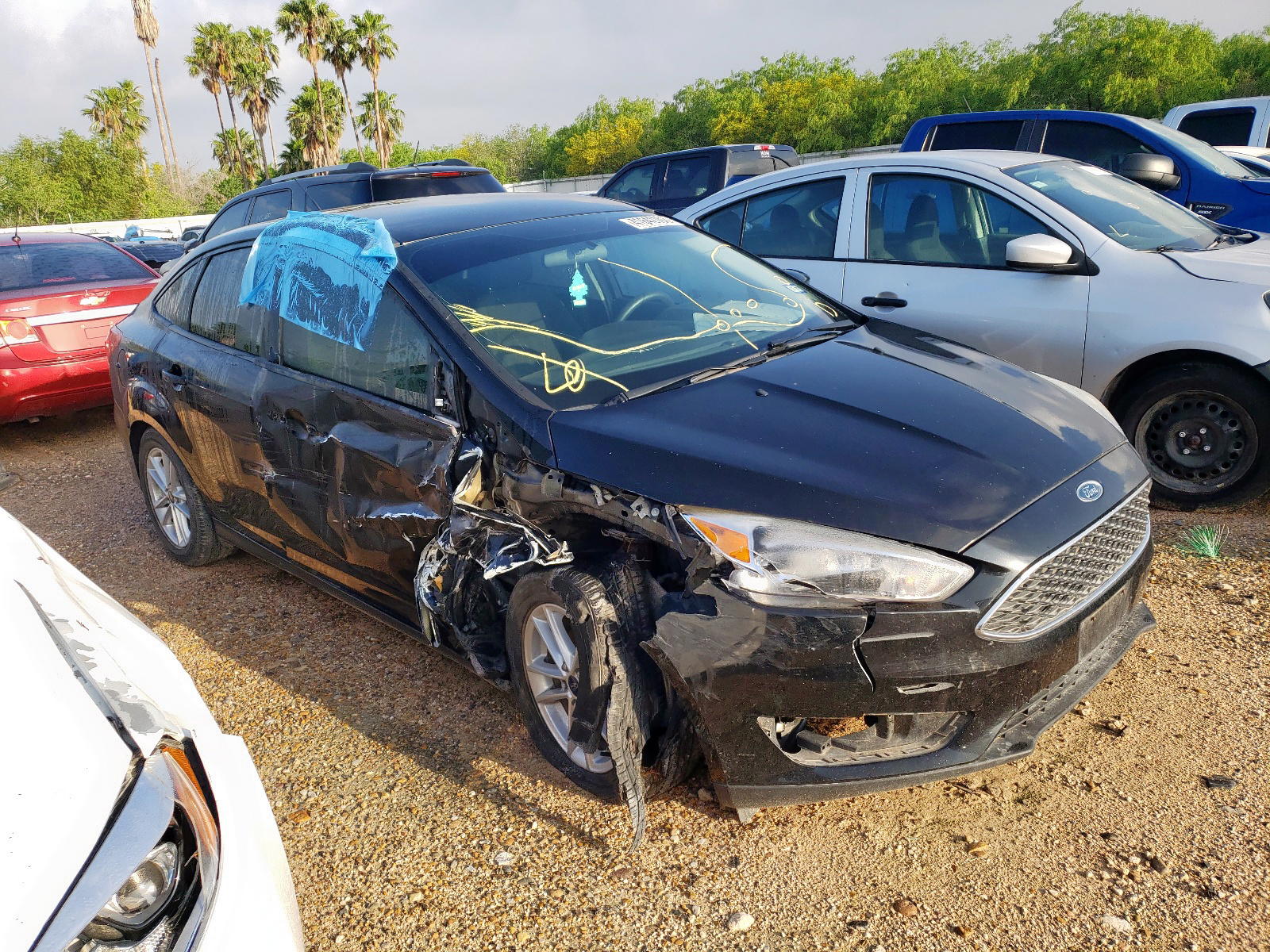 FORD FOCUS SE 2017 with VIN 1FADP3F22HL318922 - Photo from auction