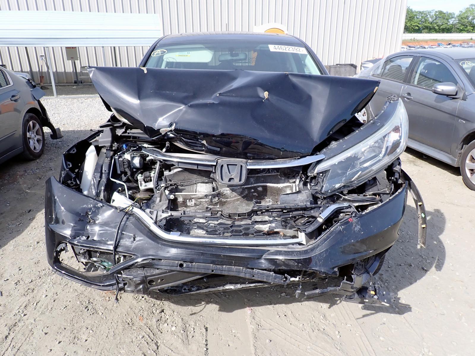 Photo 7 from auction – 2016 HONDA CR-V EX with VIN 2HKRM3H55GH526599