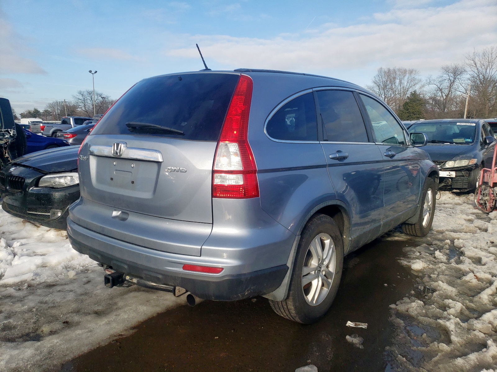 Photo 4 from auction – 2011 HONDA CR-V EXL with VIN 5J6RE4H79BL046536
