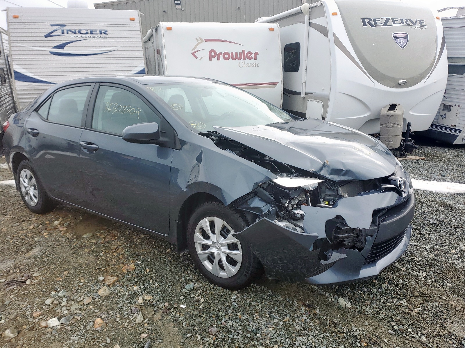 TOYOTA COROLLA L 2016 with VIN 2T1BURHE1GC652563 - Photo from auction