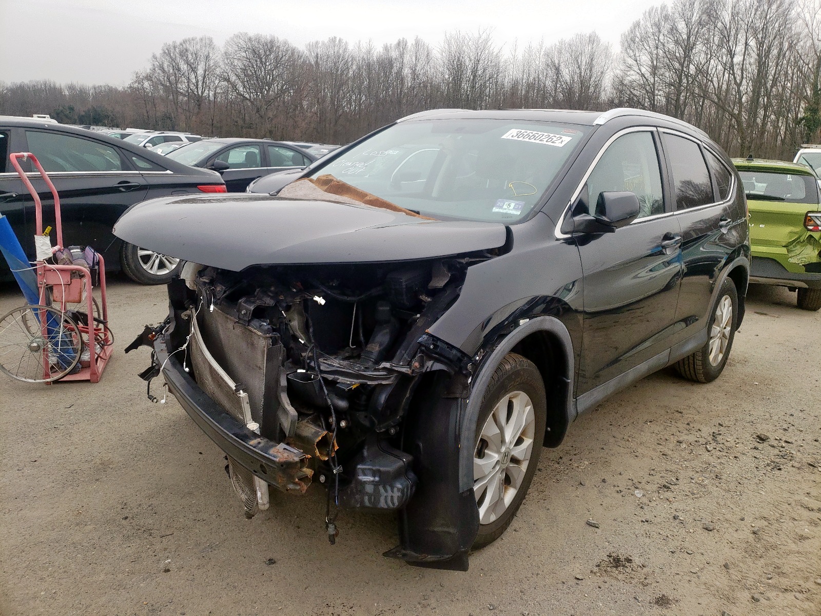 Photo 2 from auction – 2014 HONDA CR-V EXL with VIN 2HKRM4H79EH652209