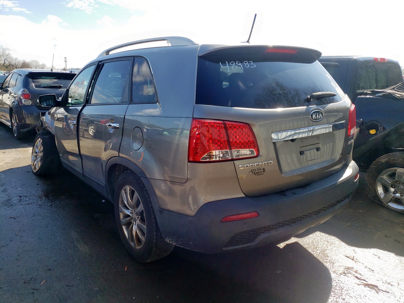 Photo 3 from auction – 2011 KIA SORENTO EX with VIN 5XYKUDA23BG036220