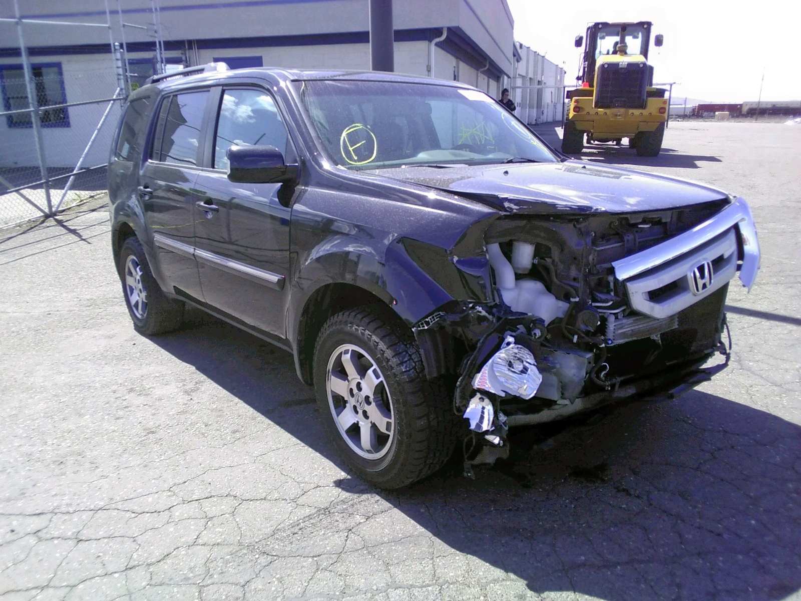 HONDA PILOT TOUR 2010 with VIN 5FNYF4H88AB039909 - Photo from auction