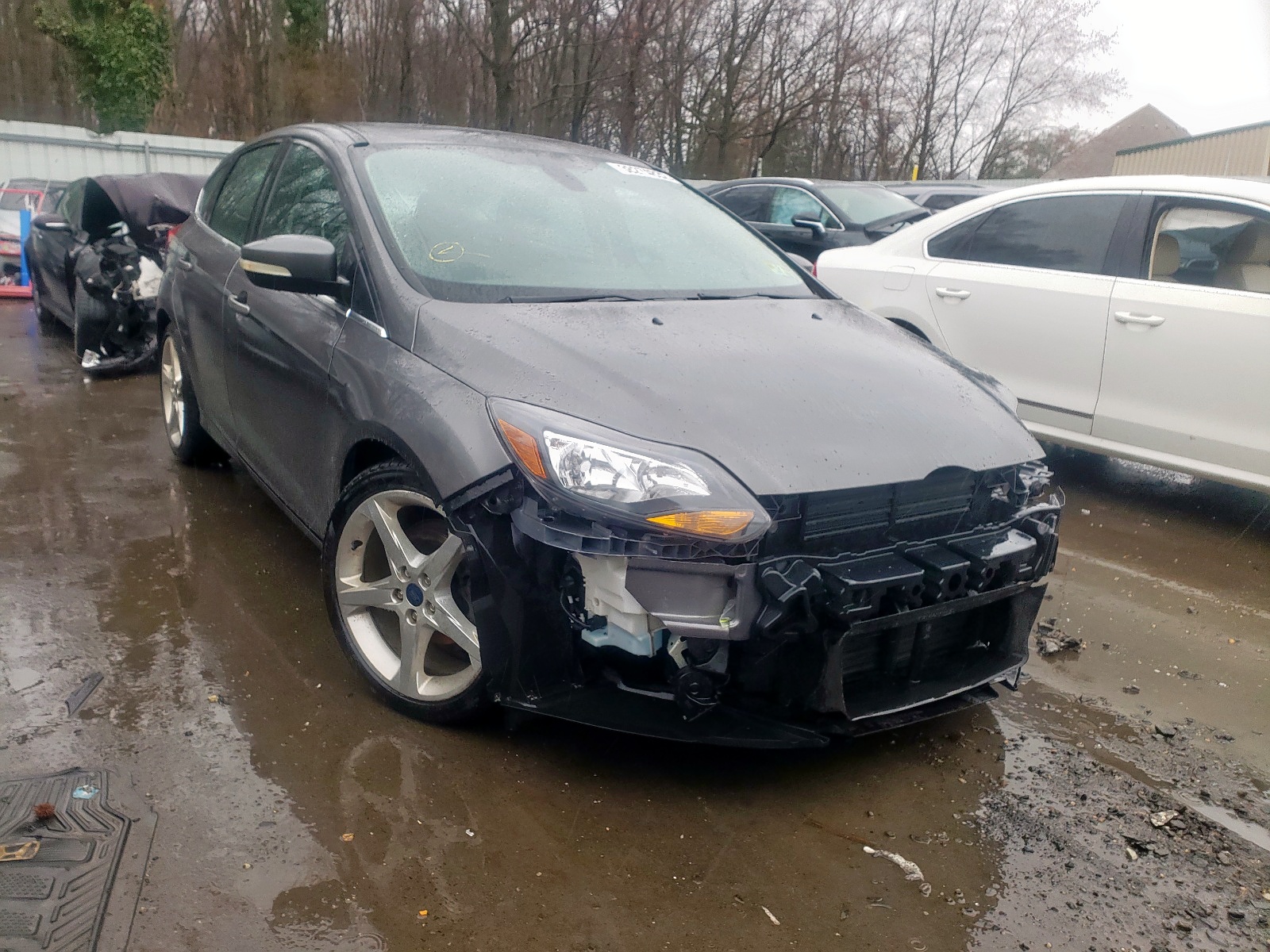 FORD FOCUS TITA 2012 with VIN 1FAHP3N21CL307258 - Photo from auction