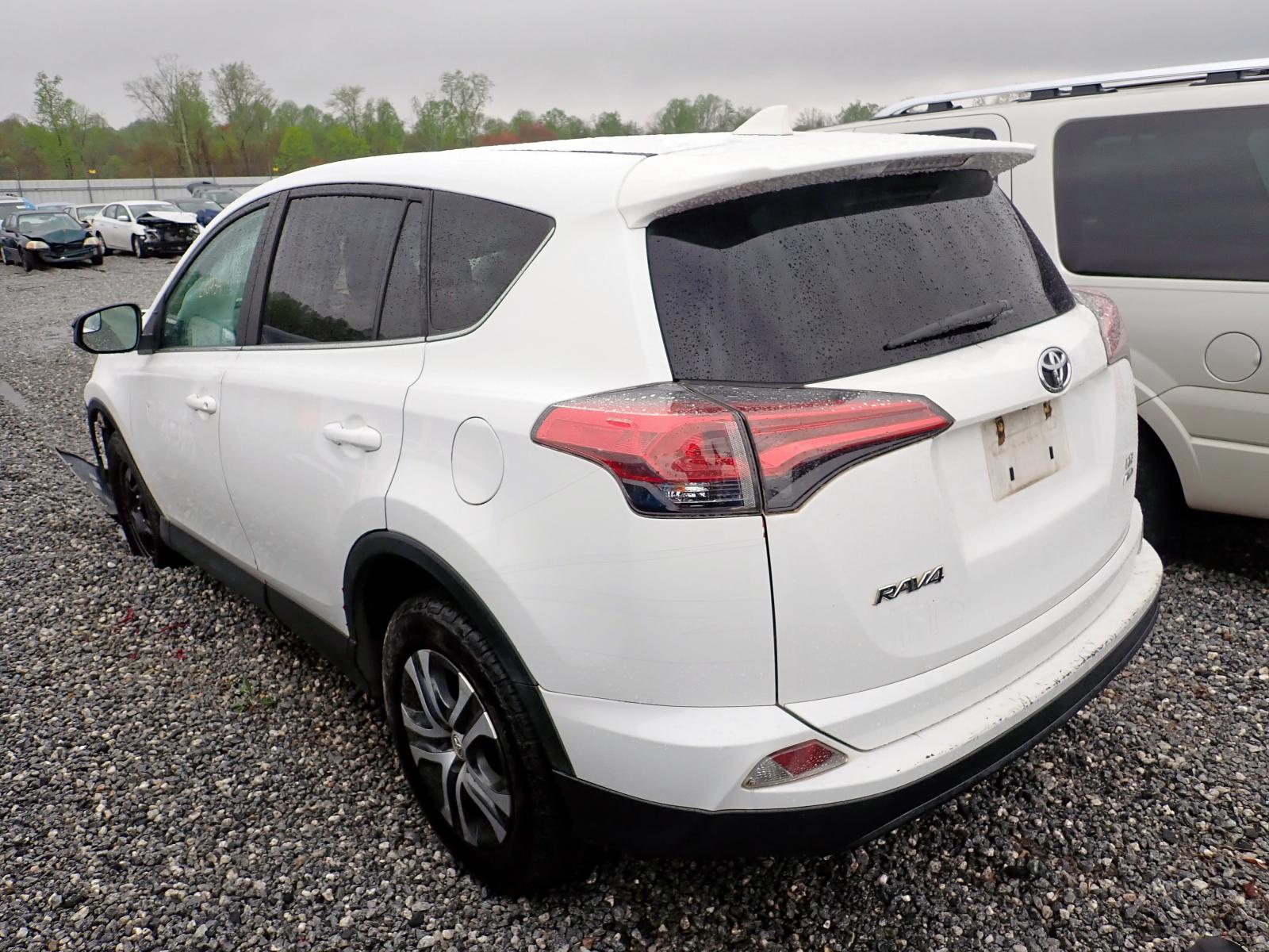 Photo 3 from auction – 2018 TOYOTA RAV4 LE with VIN 2T3BFREV1JW701319
