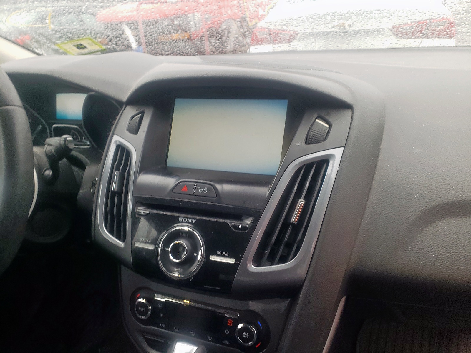 Photo 9 from auction – 2012 FORD FOCUS TITA with VIN 1FAHP3N21CL307258
