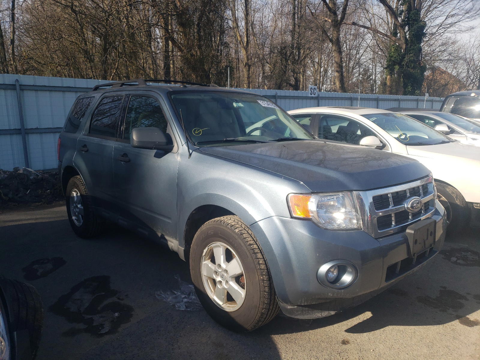 FORD ESCAPE 2011 with VIN 1FMCU9DG4BKA24673 - Photo from auction