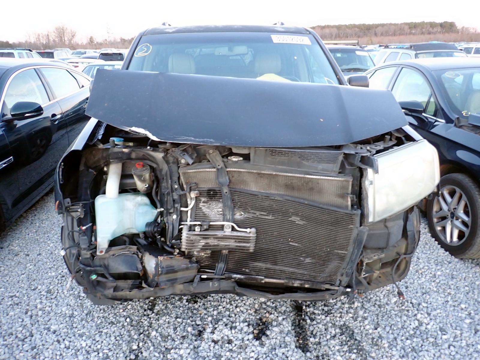 Photo 7 from auction – 2009 HONDA PILOT EXL with VIN 5FNYF38589B024595
