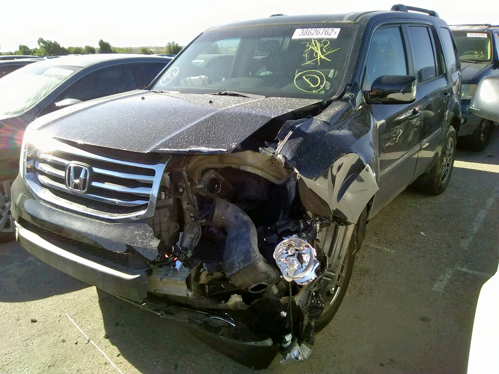 Photo 2 from auction – 2012 HONDA PILOT TOUR with VIN 5FNYF4H95CB077402