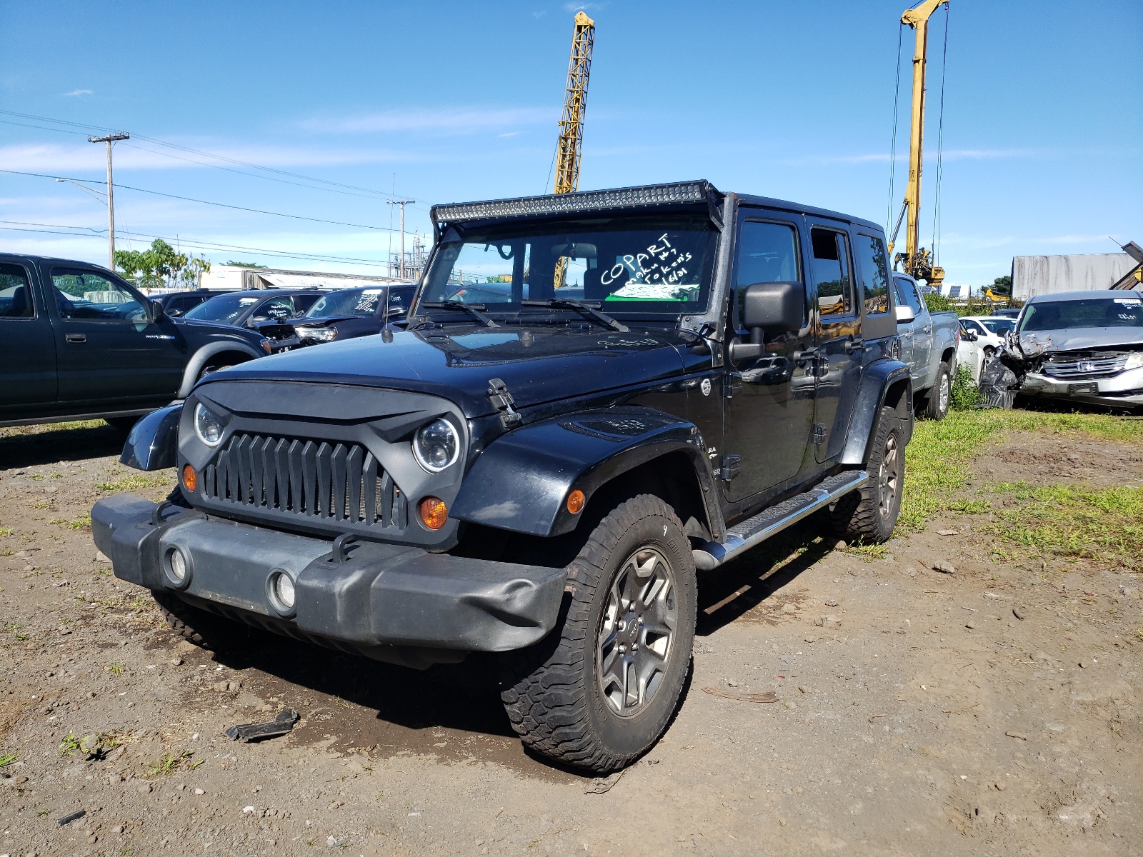 Photo 2 from auction – 2010 JEEP WRANGLER U with VIN 1J4HA5H13AL122646