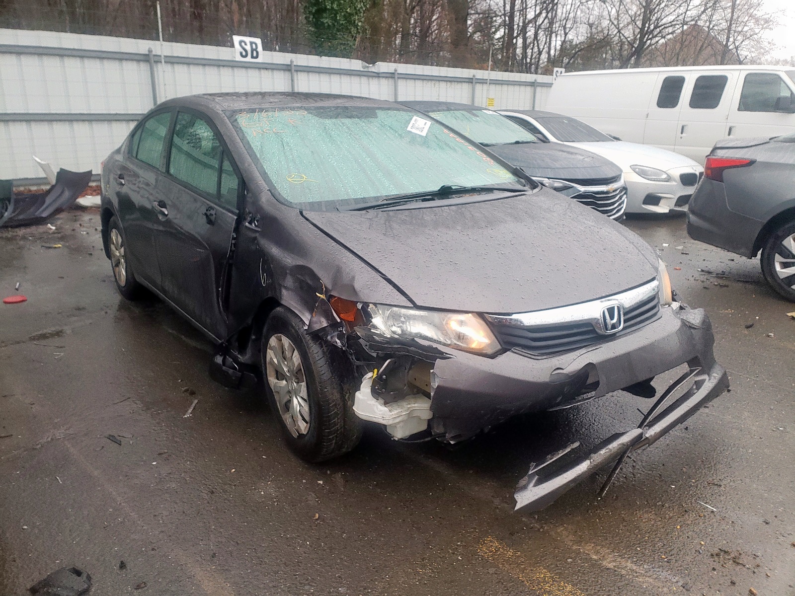 HONDA CIVIC LX 2012 with VIN 19XFB2F51CE383428 - Photo from auction