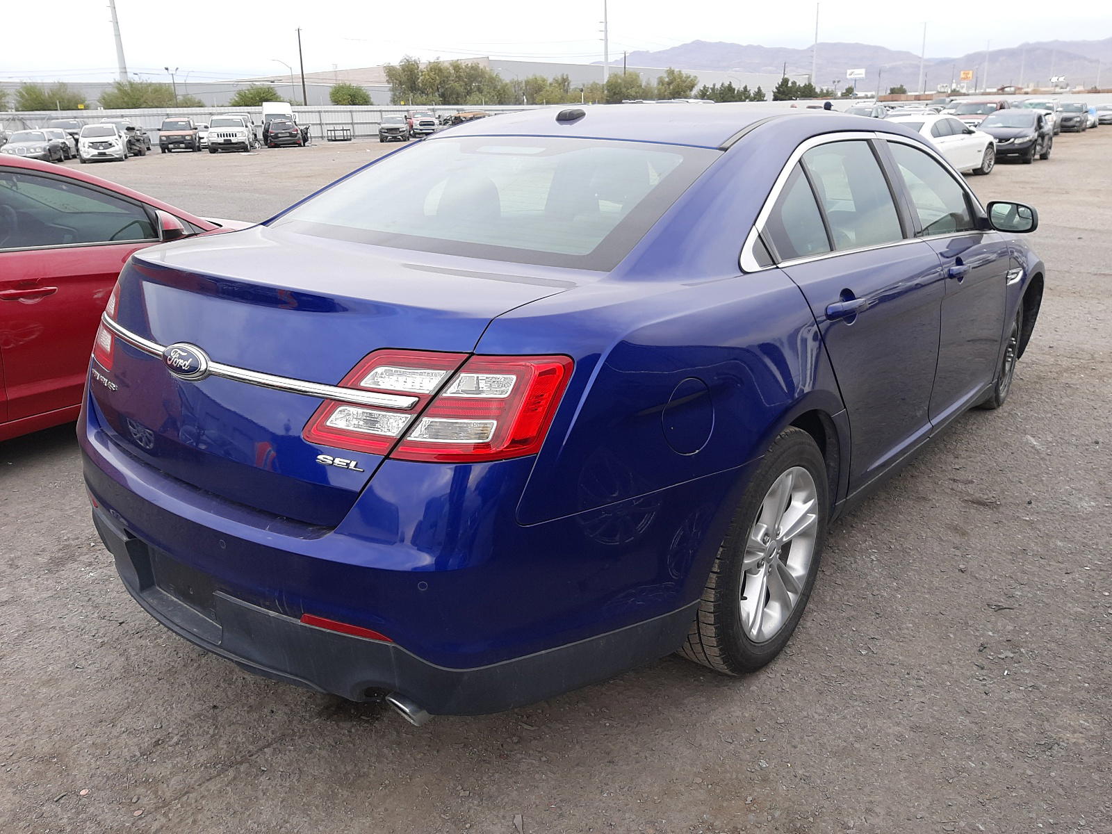Photo 4 from auction – 2013 FORD TAURUS SEL with VIN 1FAHP2E83DG229770