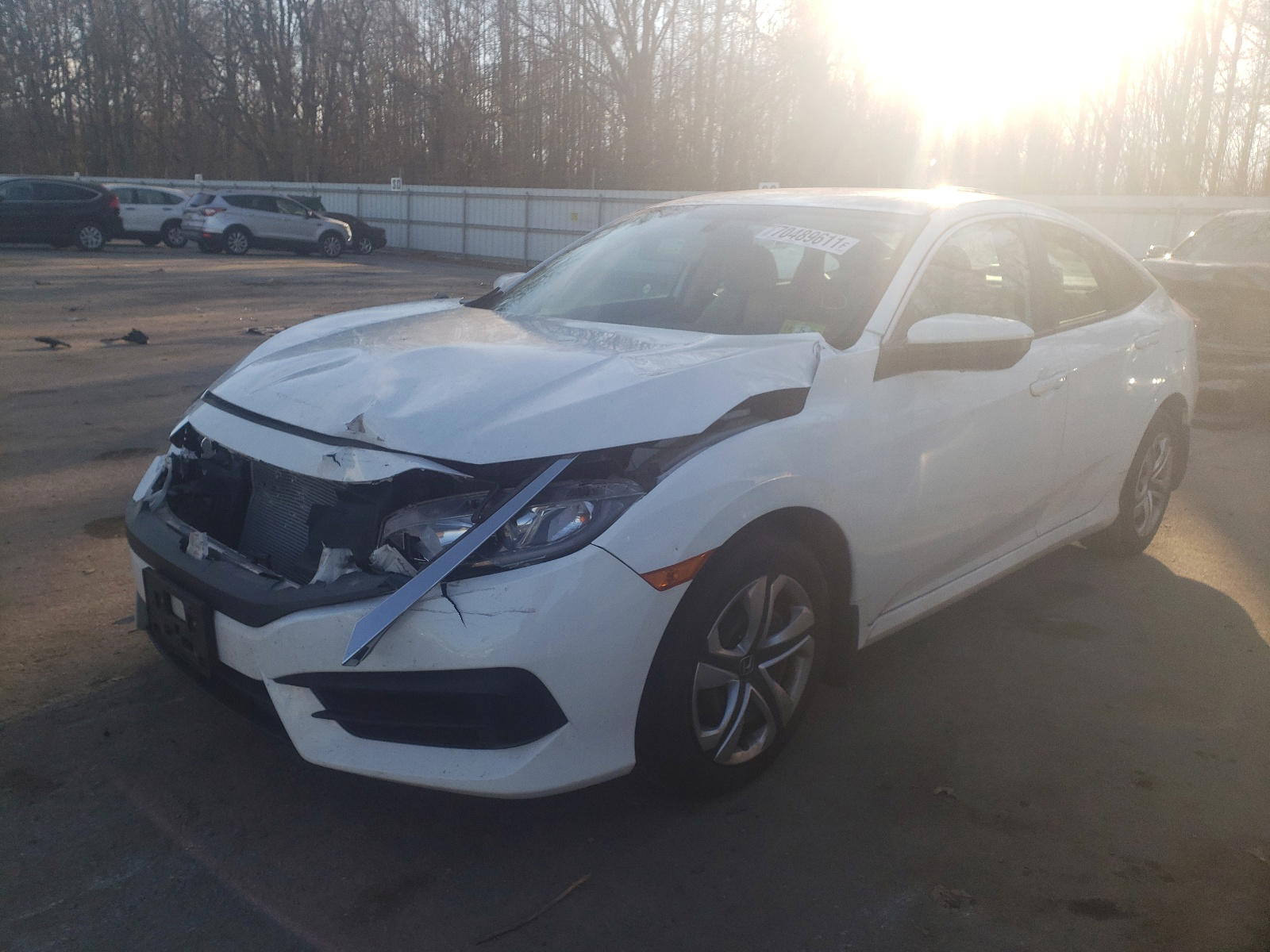 Photo 2 from auction – 2016 HONDA CIVIC LX with VIN 19XFC2F52GE222539