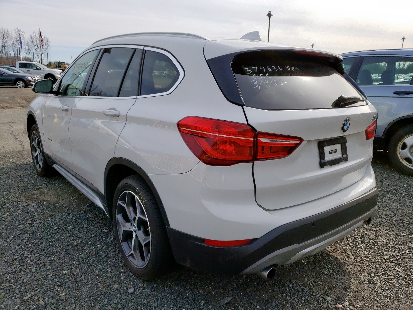 Photo 3 from auction – 2017 BMW X1 XDRIVE2 with VIN WBXHT3C31H5F80848